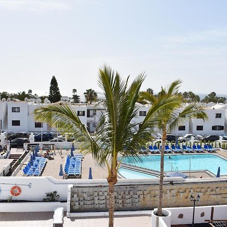 Appartement Aguazul - A Pie De Piscina Y Vistas Al Mar à Puerto del Carmen  Extérieur photo