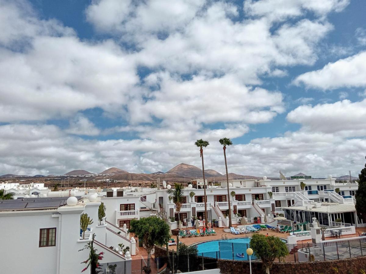 Appartement Aguazul - A Pie De Piscina Y Vistas Al Mar à Puerto del Carmen  Extérieur photo
