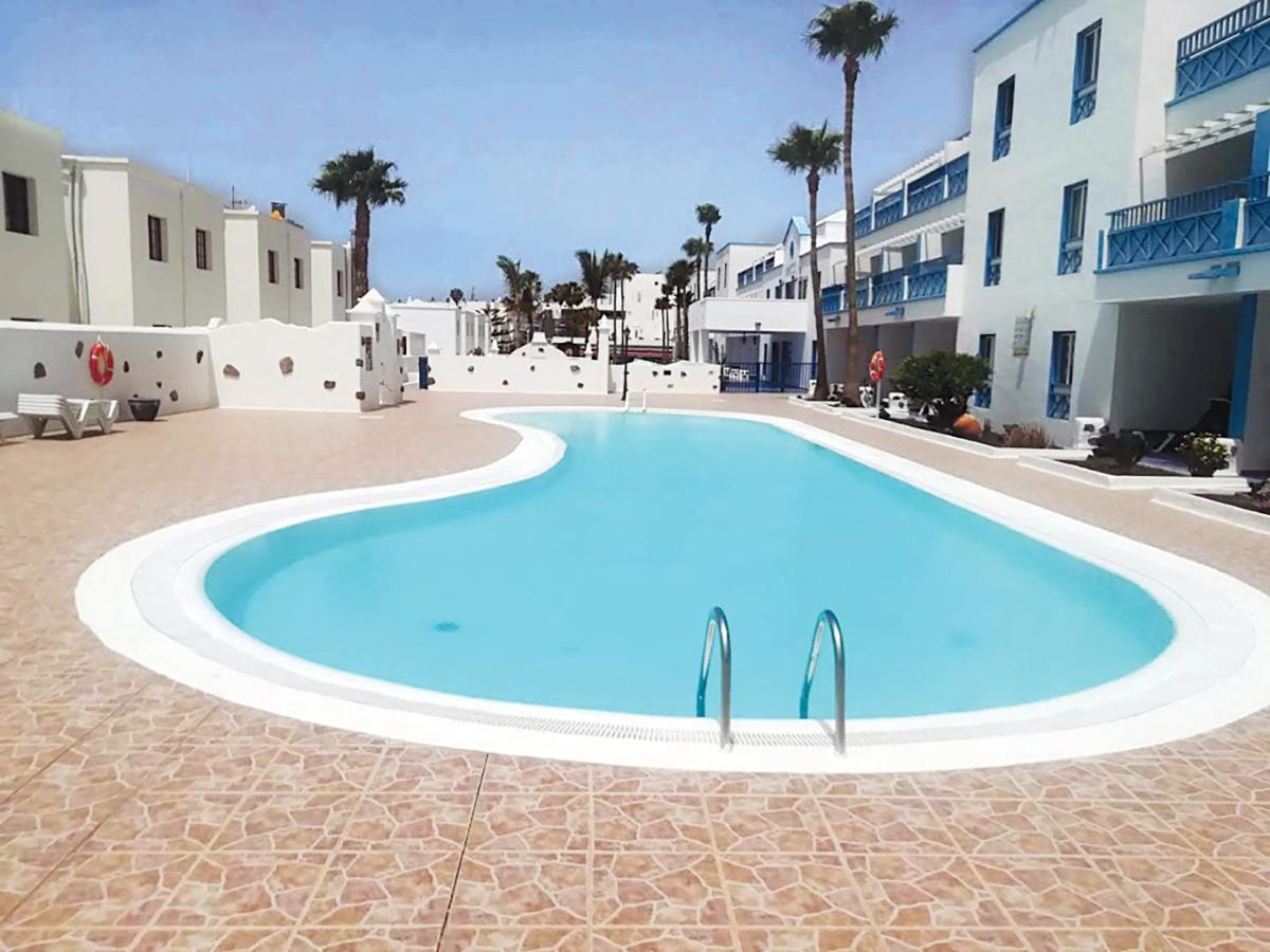 Appartement Aguazul - A Pie De Piscina Y Vistas Al Mar à Puerto del Carmen  Extérieur photo