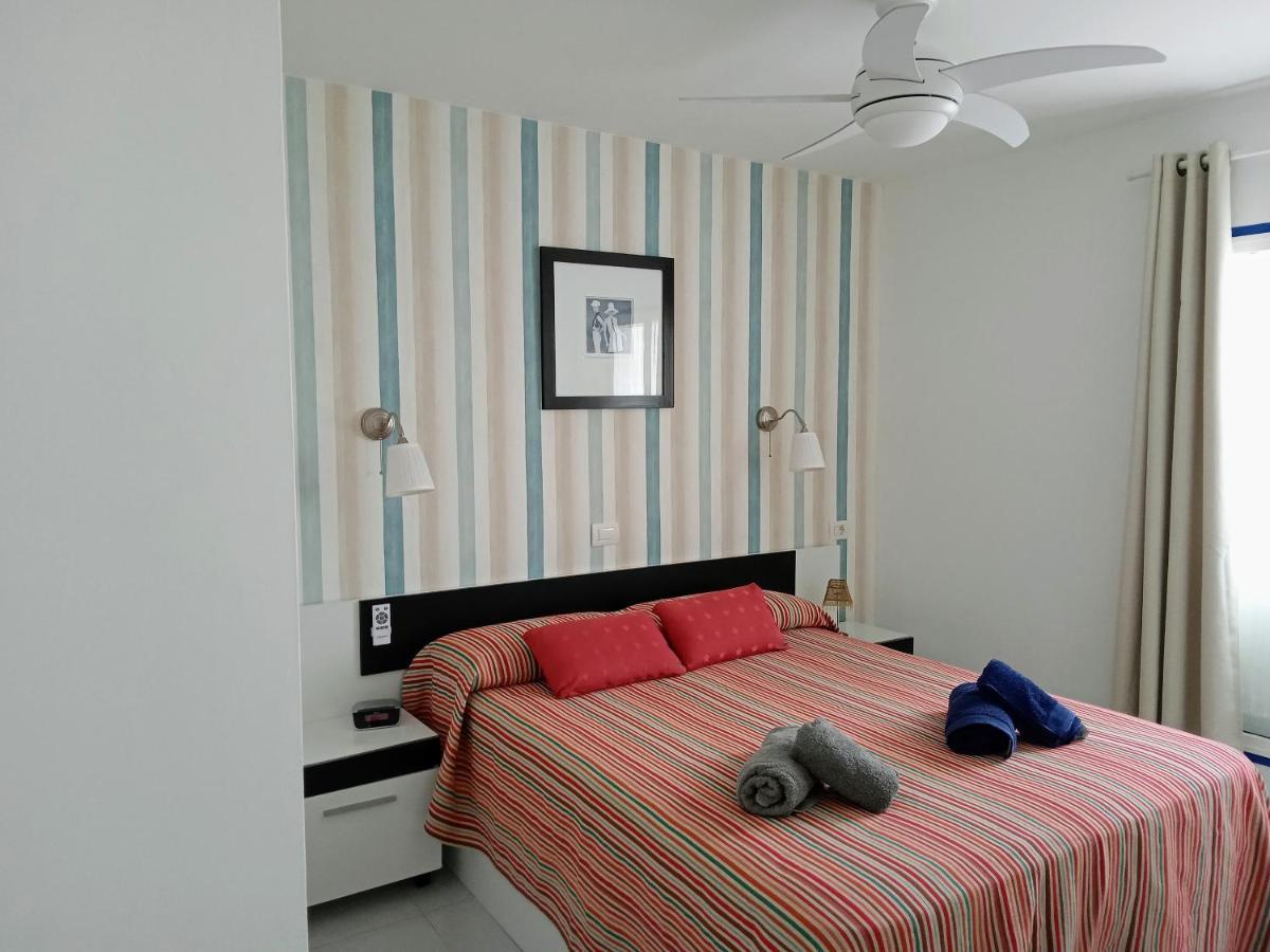 Appartement Aguazul - A Pie De Piscina Y Vistas Al Mar à Puerto del Carmen  Extérieur photo