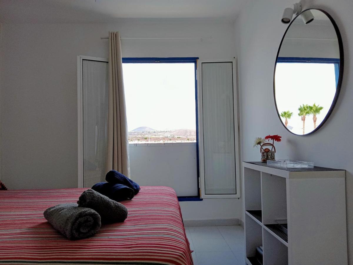 Appartement Aguazul - A Pie De Piscina Y Vistas Al Mar à Puerto del Carmen  Extérieur photo