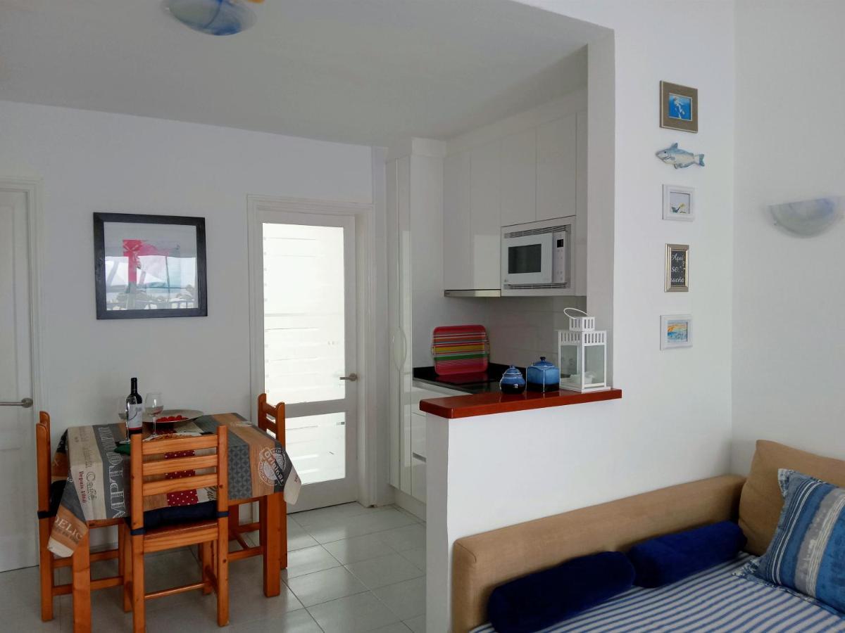 Appartement Aguazul - A Pie De Piscina Y Vistas Al Mar à Puerto del Carmen  Extérieur photo