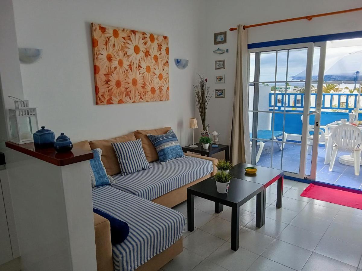 Appartement Aguazul - A Pie De Piscina Y Vistas Al Mar à Puerto del Carmen  Extérieur photo