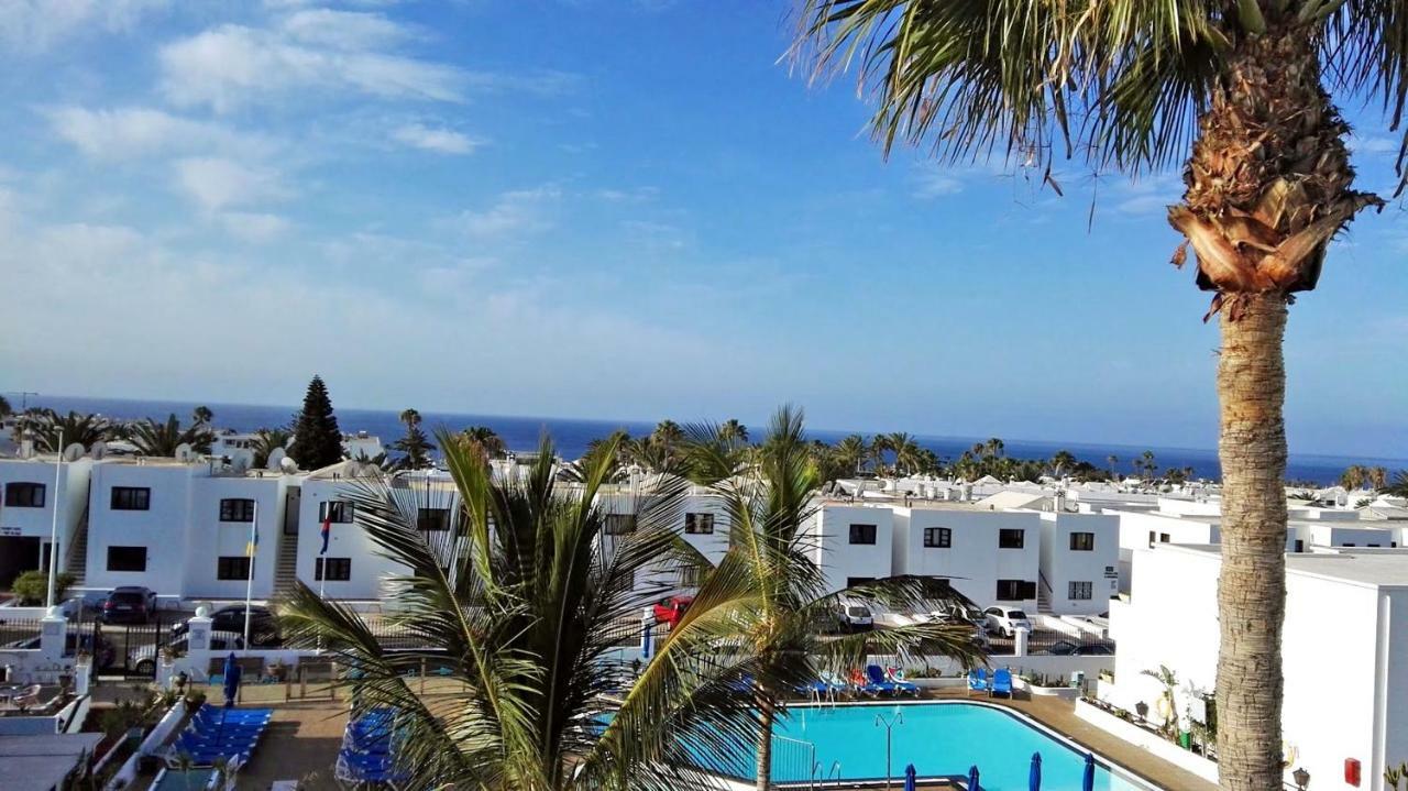 Appartement Aguazul - A Pie De Piscina Y Vistas Al Mar à Puerto del Carmen  Extérieur photo